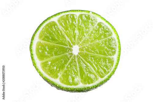 Close Up Sliced Green Lime With Juicy Segments On Black Background citrus fruit