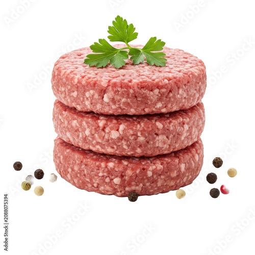 Three perfectly stacked raw ground lamb patties, fresh pinkish-red, with green parsley and scattered colorful peppercorns on a transparent background, gourmet ingredients concept