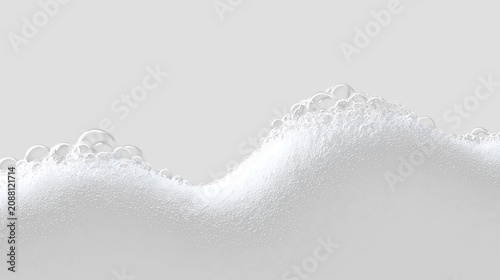 фотографія Bubbles form a white foam texture on a transparent background that suggests a li