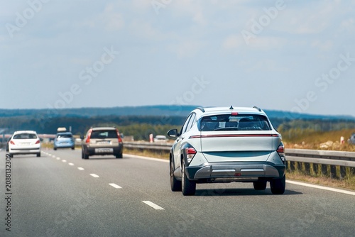 Obraz na plátně Reliable crossover car in natural outdoor setting