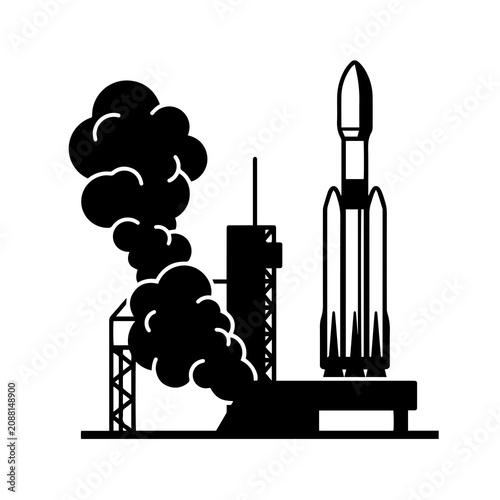 Black silhouette of a space rocket standing on a launch pad with smoke billowing from the base on a plain white background isolated
