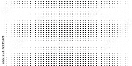 Bild auf Leinwand Abstract monochrome halftone background with black dots fading on white backdrop