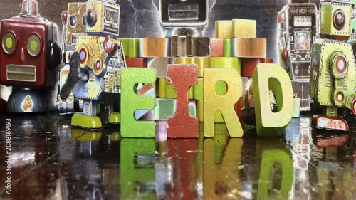 Retro bot, make the word WEIRD stop motion animation 