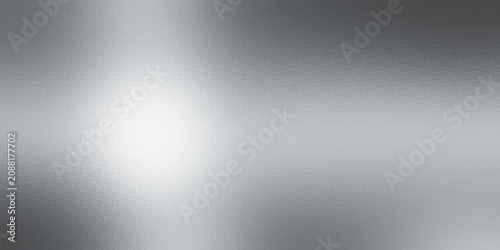 Silver foil texture background with light reflection/Brushed polished silver metal texture with reflexion background