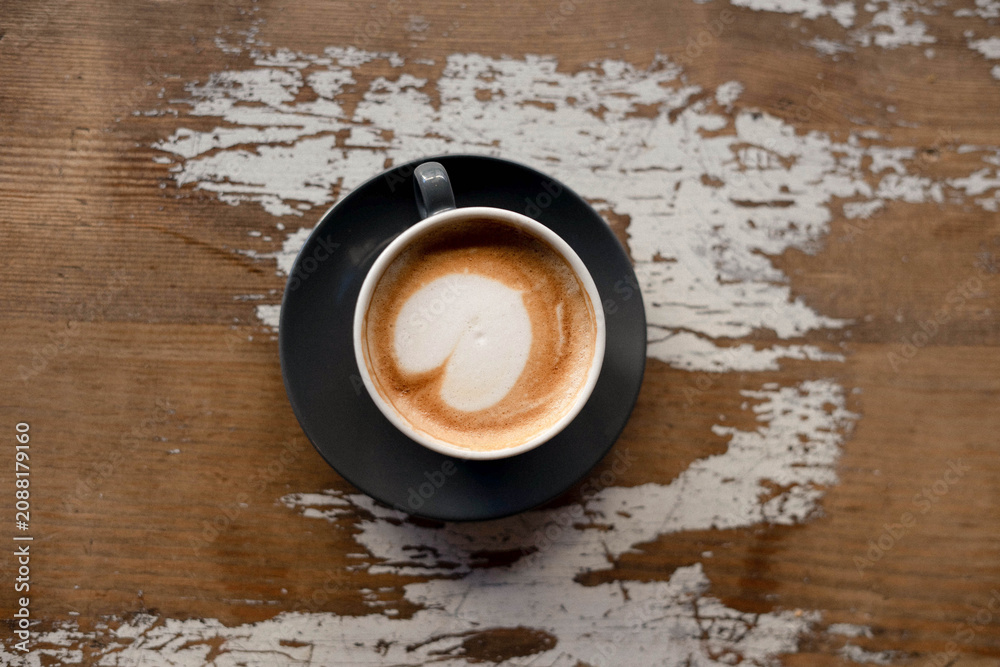 Fototapeta premium Cozy cappuccino from above with film grain aesthetic