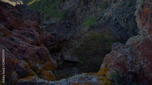 Panning over Masca valley and cave