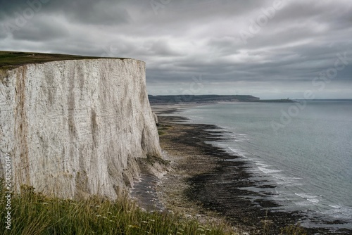 Εκτύπωση καμβά Dover white cliffs and expansive coastline, overcast weather, cinematic landscape