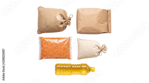 Sustainable food packaging set with burlap sacks, paper bag, plastic pouch of red lentils and cooking oil bottle for donation or grocery storage isolated PNG with Transparent Background