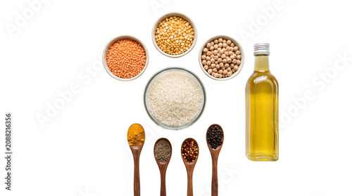 Assorted pantry staples with grains, legumes and spices. Healthy cooking ingredients including rice, lentils, chickpeas and olive oil. Culinary food composition. isolated PNG with Transparent