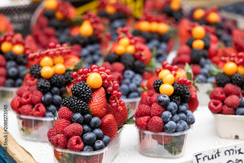 Photography Fresh berry fruit mix cups at Havelska market in Prague