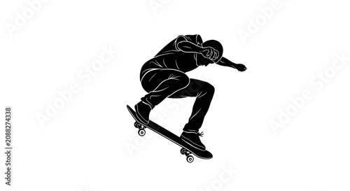 Sport siluet of a skilled skateboarder performing an airborne trick jump on a skateboard