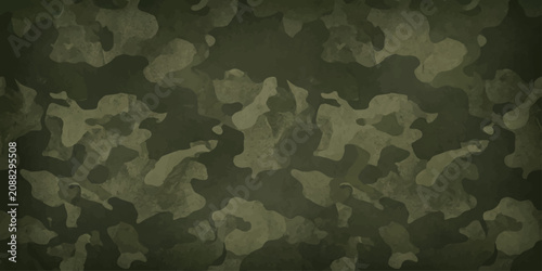 Fotografie Camouflage pattern in shades of green and beige, creating a textured backdrop ideal for military or outdoor themes