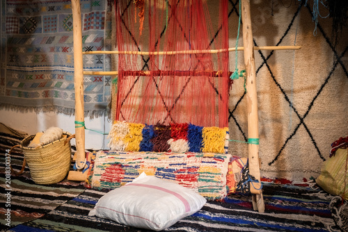 Weaving loom in the carpet production factory in Morocco