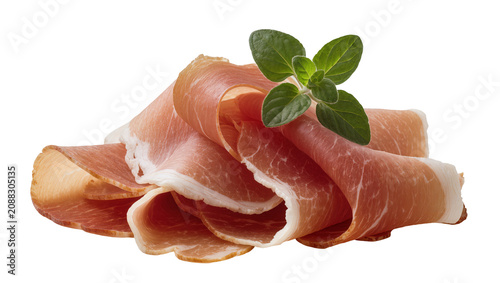 Cuadro en lienzo Thinly sliced prosciutto ham with fresh green oregano sprig, isolated on transpa