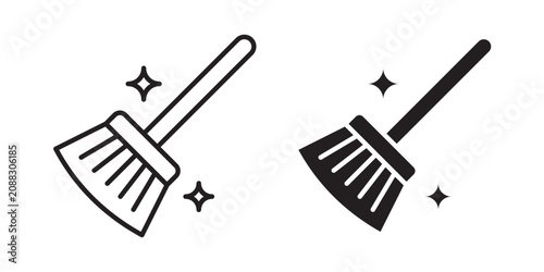 Broom sweeping dust icon