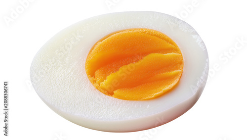 Фотография Half hard-boiled egg with bright orange yolk, isolated on transparent background