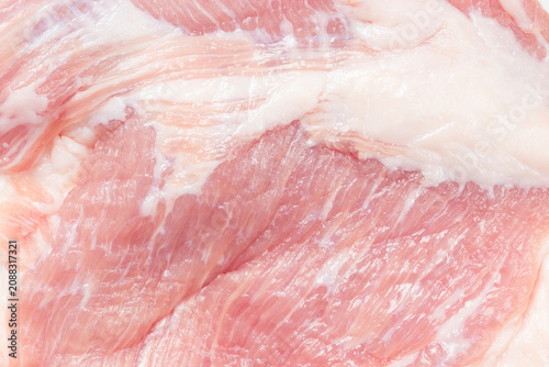 Raw pork neck meat for texture and background.