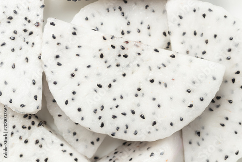 Pile of fresh sliced dragon fruit chunks. Top view