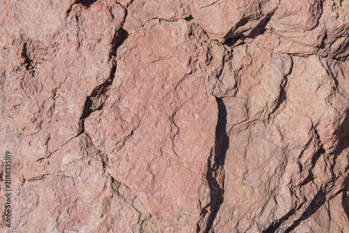 Ancient lava rock formations with distinctive geological layers in Tenerife's volcanic landscape.