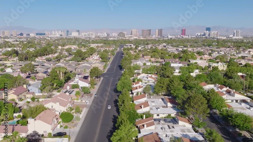 Las Vegas Neighborhood Lateral Aerial with Strip Skyline and Mountain View 01
