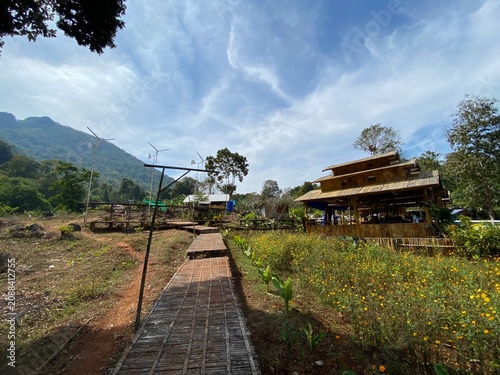 The atmosphere of Khao Yen Cafe, a coffee shop located within the Thong Pha Phum District Prison in Kanchanaburi Province, Thailand.