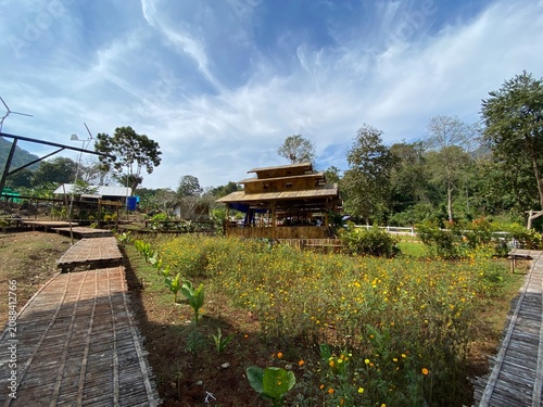 The atmosphere of Khao Yen Cafe, a coffee shop located within the Thong Pha Phum District Prison in Kanchanaburi Province, Thailand.