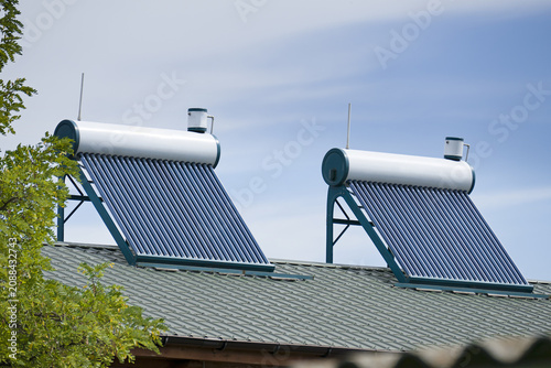 Solar Water Heaters Installed on Residential Roof
