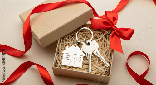 House key set in gift box with red ribbon