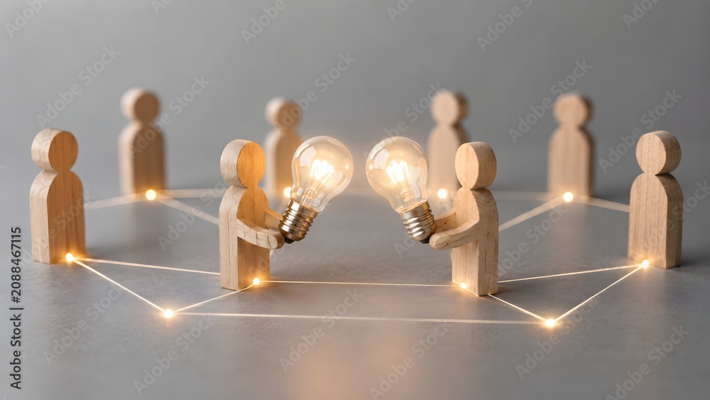 Obraz premium Knowledge transfer and collaborative innovation showing wooden figures exchanging glowing lightbulb ideas in team network