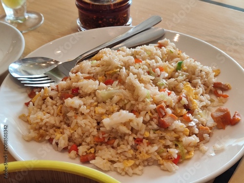 Konstfotografi Asian fried rice with egg and vegetables served on plate