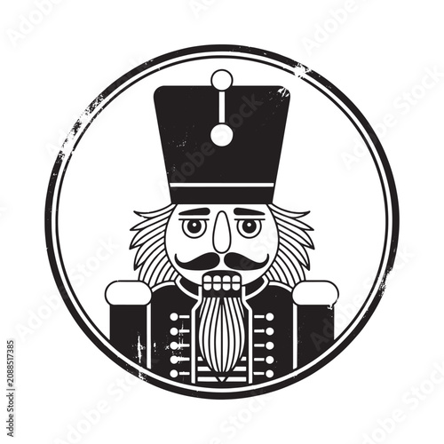 Nutcracker soldier silhouette within a circular frame black and white