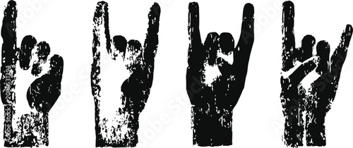 Grunge black hand gestures showing rock and roll sign set with rough texture