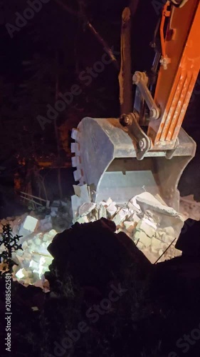 clearance operations by heavy machinery at the site of a residential building hit by a Russian missile in Darnytskyi district, Kyiv, July 2, 2026