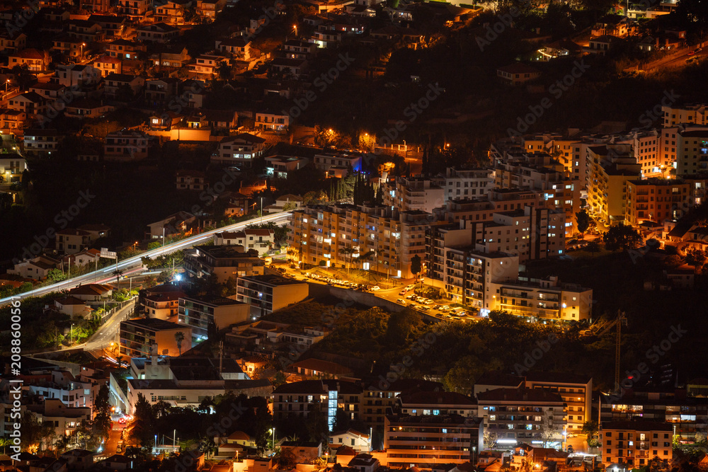 Fototapeta premium Funchal, Madeira, Portugal. Vibrant capital city of Madeira Island featuring scenic coastal views, colorful architecture, picturesque harbor, and a unique blend of history, culture, and natural beauty