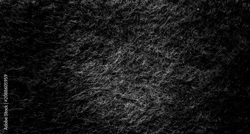 Abstract dark black textured background with fine white fibers