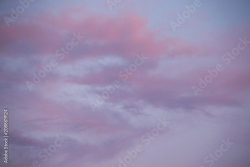 pastel winter sky with pink and purple clouds