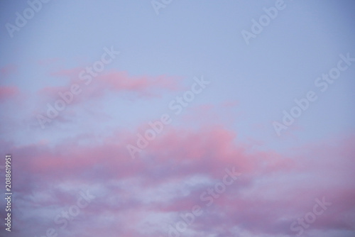 pastel winter sky with pink and purple clouds
