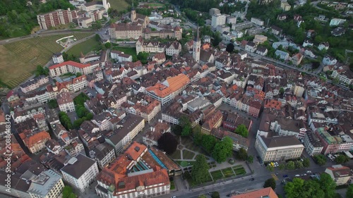 Aerial panoramic view above the old town around the city Chur in Switzerland on a sunny summer afternoon. 