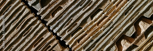 Cuadro en lienzo Stack of recycled cardboard egg cartons arranged in rows