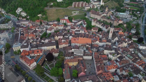 Aerial panoramic view above the old town around the city Chur in Switzerland on a sunny summer afternoon. 
