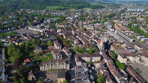 Aerial panoramic view above the old town around the city Frauenfeld in Switzerland on a sunny summer afternoon. 