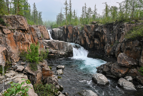 Mountain stream on a cloudy summer day.
