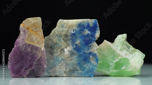 Natural minerals - blue lazurite or Azure spar, green and violet fluorites