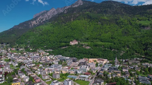 Aerial panoramic view above the downtown around the capitol city Vaduz in Liechtenstein on a sunny summer afternoon. 
