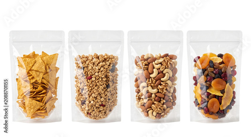 Fotografie Four transparent snack pouches filled with food isolated on transparent backgrou