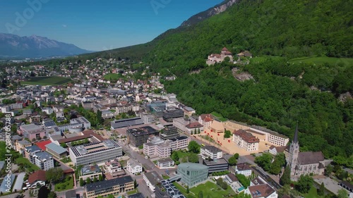 Aerial panoramic view above the downtown around the capitol city Vaduz in Liechtenstein on a sunny summer afternoon. 