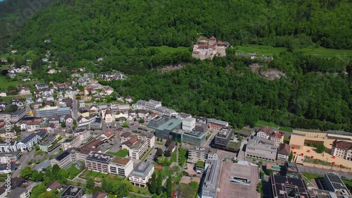 Aerial panoramic view above the downtown around the capitol city Vaduz in Liechtenstein on a sunny summer afternoon. 