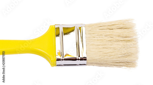 Tableau sur toile Yellow handled paintbrush with metal ferrule and natural bristles, isolated on t