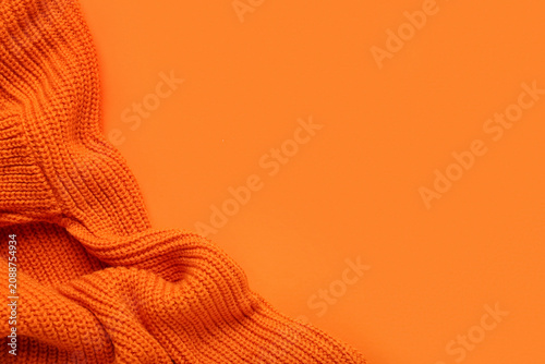 Knitted orange fabric on co...