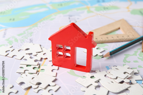 House figure with puzzle pi...